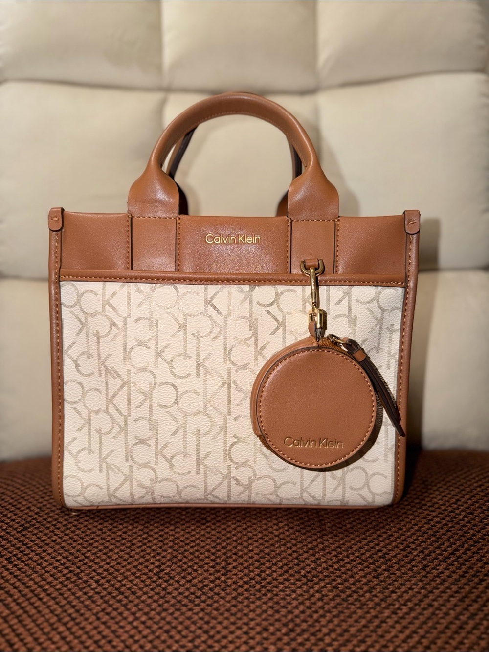 Calvin Klein Cream Signature Canvas Tote with Tan Leather Trim